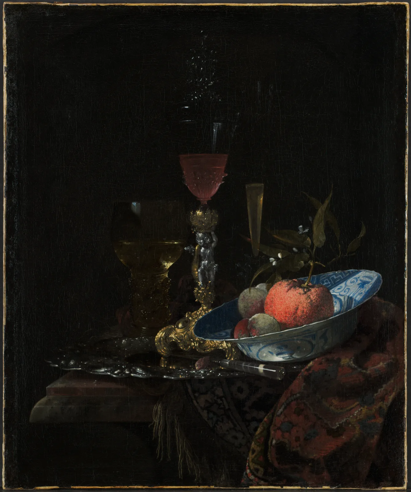Wineglass and a Bowl of Fruit by Willem Kalf